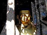 Kathmandu Swayambhunath 22 Akshobhya East Dhyani Buddha Statue Behind Mesh At Top Of Stairs